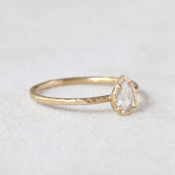 0.13ct colorless diamond ring