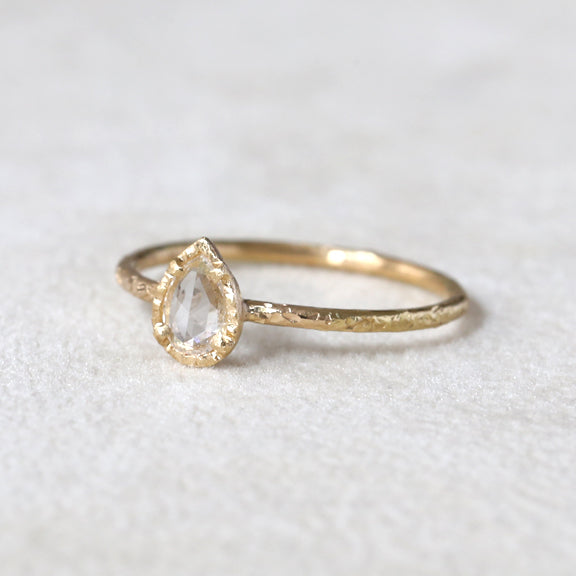 0.13ct colorless diamond ring