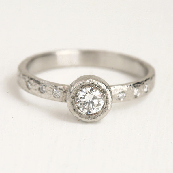 Platinum 4mm diamond ring
